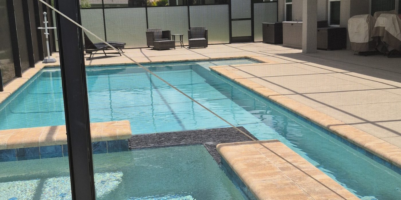 Screened pool and spa enclosure completed by Exact Aluminum Solutions in Central Florida