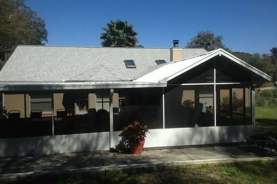 Screened porch addition on a Central Florida home — Exact Aluminum Solutions