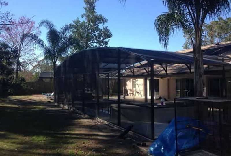 Screen enclosure installation in progress — Exact Aluminum Solutions Central Florida
